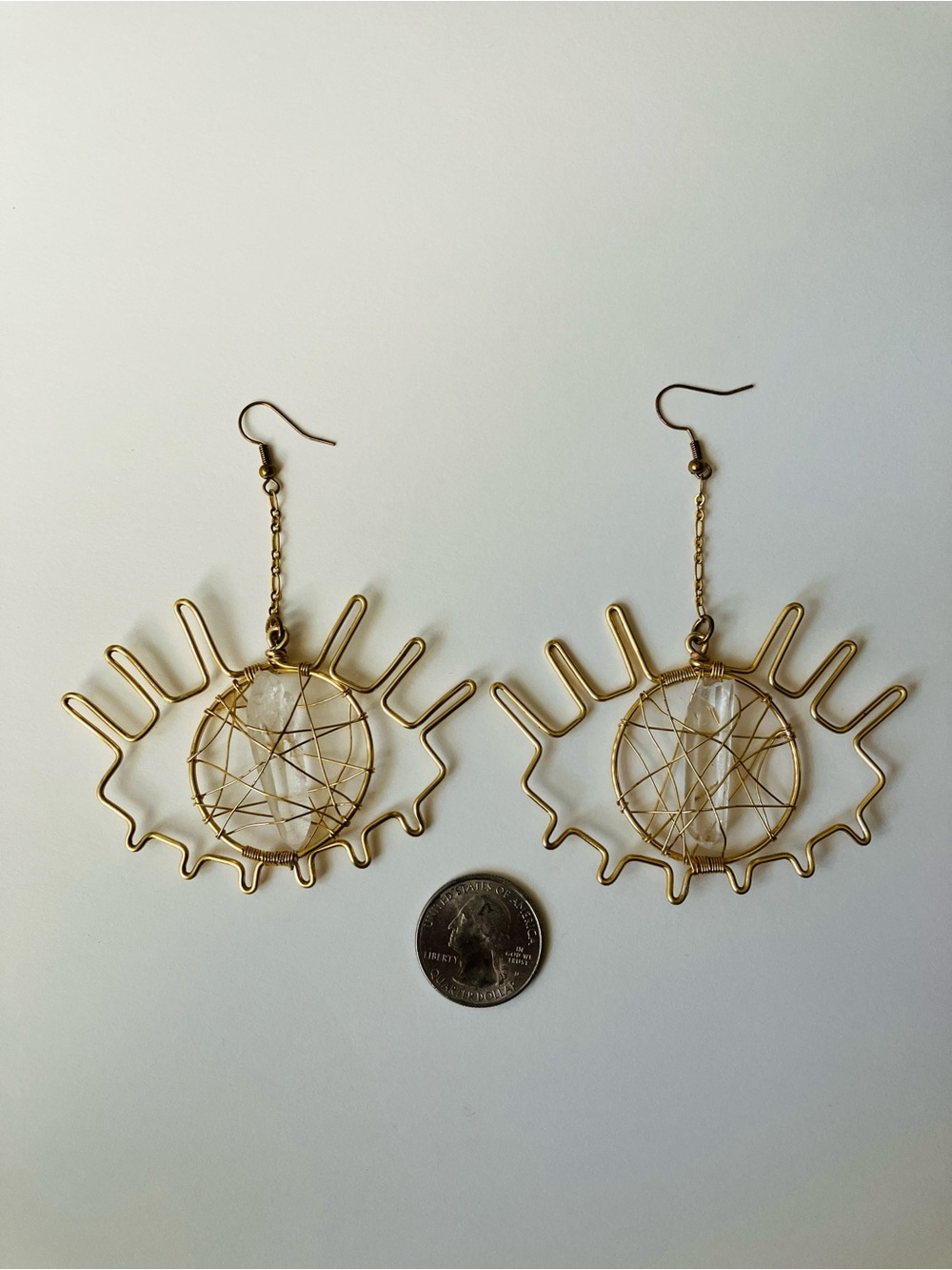 Gold Eye-Shaped Wire Drop Earrings with Clear Stone Accent